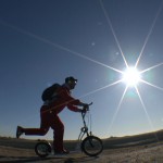 Michael Wigge on his scooter against the sunlight