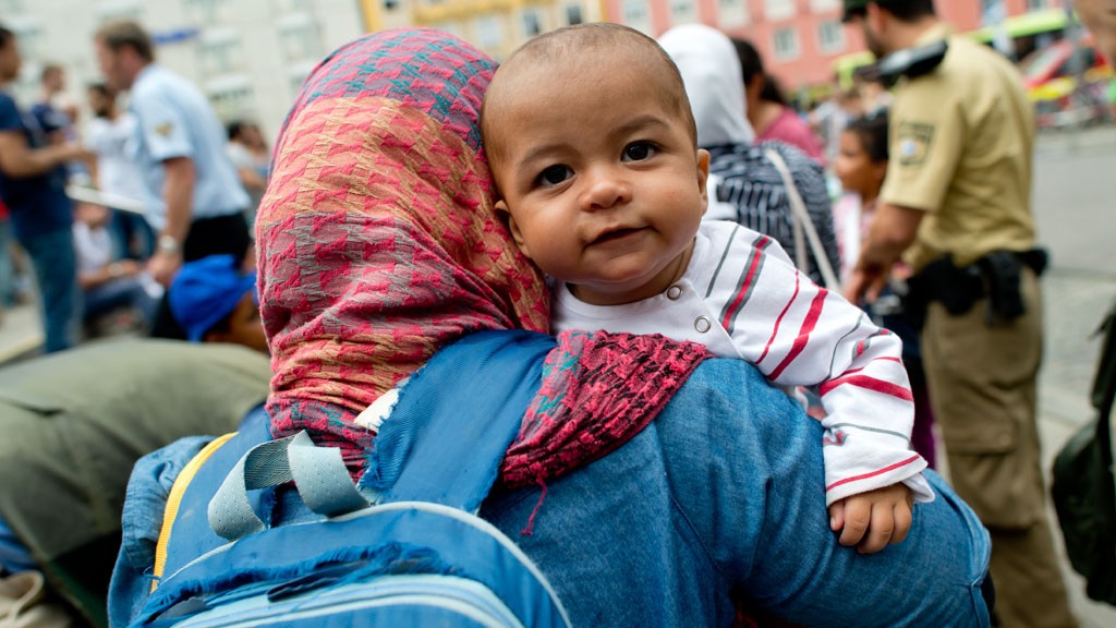 A women from Syria with her baby as they have just arrived in Münich. @ picture-alliance/dpa/S. Hoppe